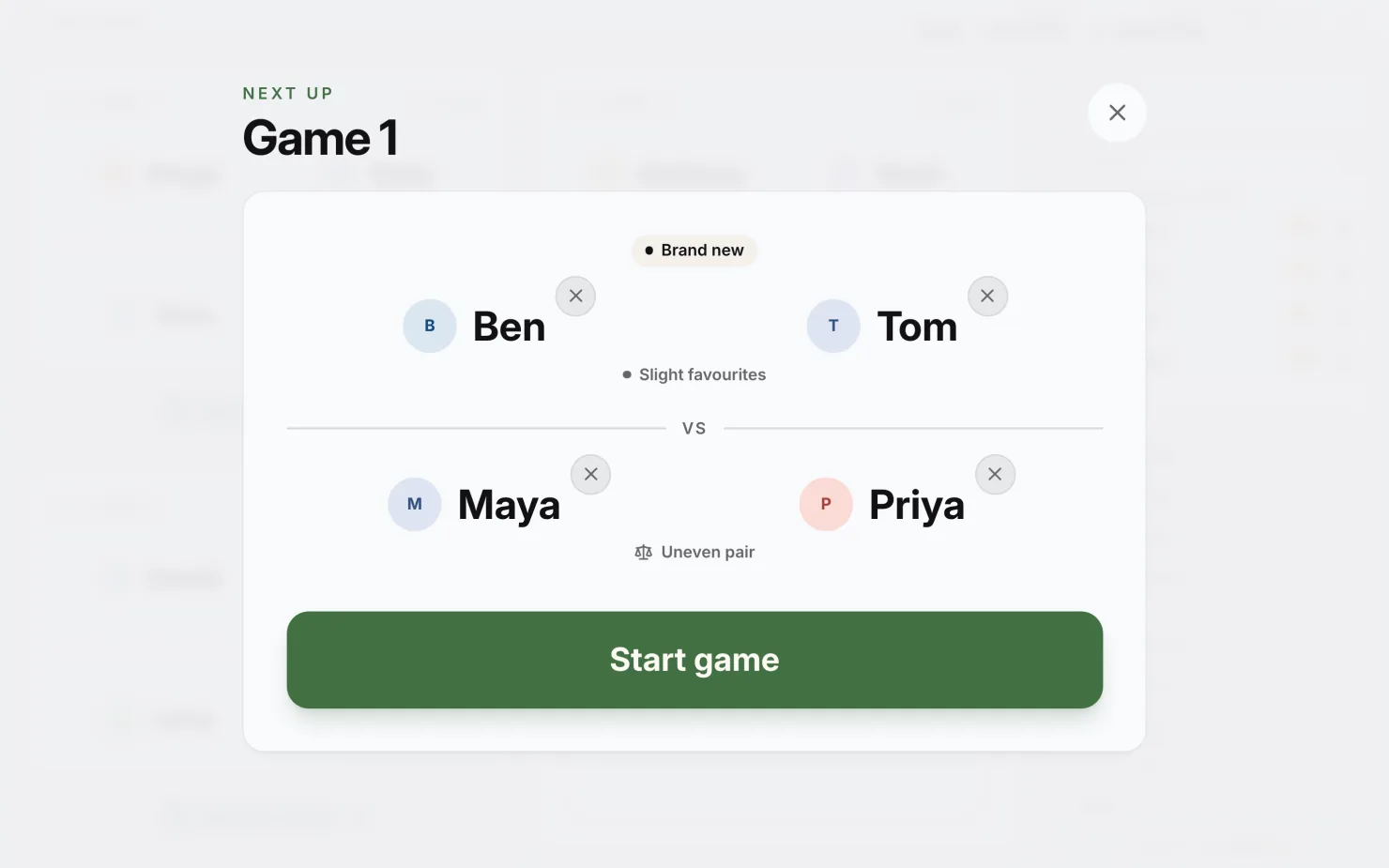 The next-game sheet on the courtside tablet, one tap on the empty court — Next up, Game 1, a doubles game: Ben & Tom, slight favourites, against Maya & Priya, and one green Start game button to send them on.